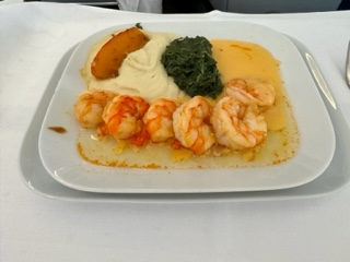 Roasted King Prawn with Lobster Sauce. Cauliflower Vanilla Puree. 
Leaf Spinach. Pumpkin Wedges